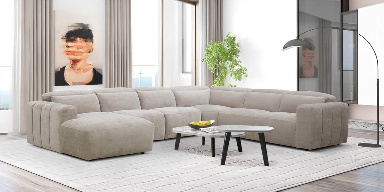 KM.6667 modular sofa extended into a large U-shaped configuration around an oval coffee table
